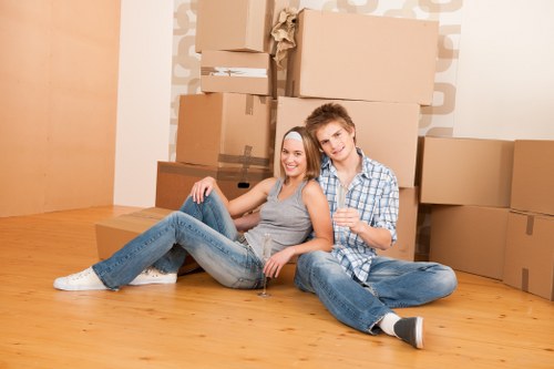 Removal team preparing boxes and furniture safely during a move