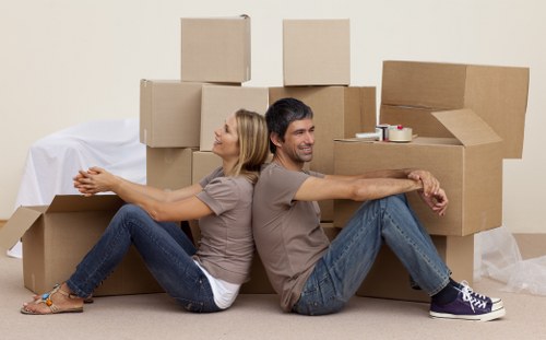 Careful unpacking and organising in a modern Docklands home