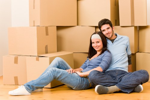 Packed boxes and furniture ready for a home move in Docklands