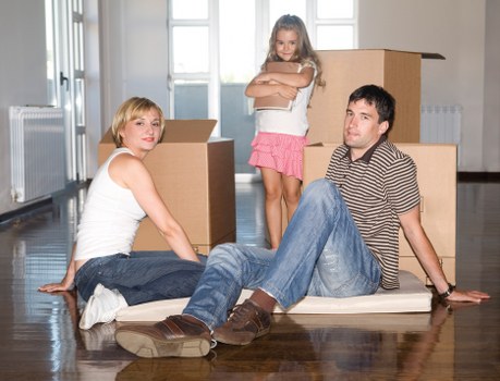 Moving crew working in a modern Docklands residential building